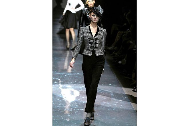 Even the king of cool Giorigio Armani dipped into the glittering garb of Ziggy, adding bedazzled fedoras and booties to Armani Prive's Fall 2007 look. ; Photo: Getty