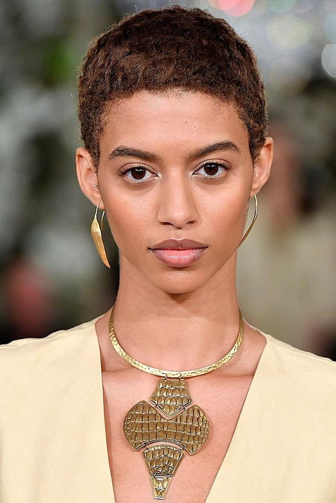 The models donned an uber natural, no-makeup makeup look, featuring flawless satin skin and hardly any colour bar a light wash of shimmer on the lids and nude-pink gloss.  The laidback look pairs perfectly with the bohemian, relaxed vibe of the collection. Photo: Getty 