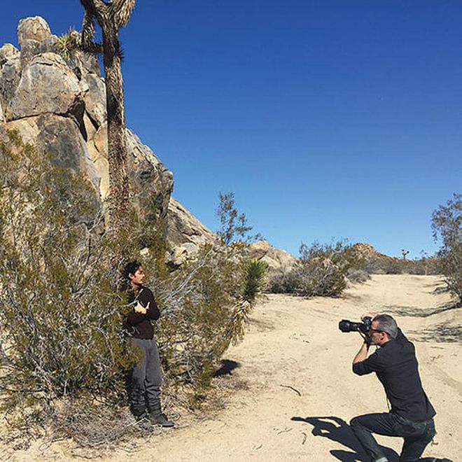 That's typical Yu Tsai and his antics of doing his signature 'Models, Models Models' action on the desert of Palm Dale, California.