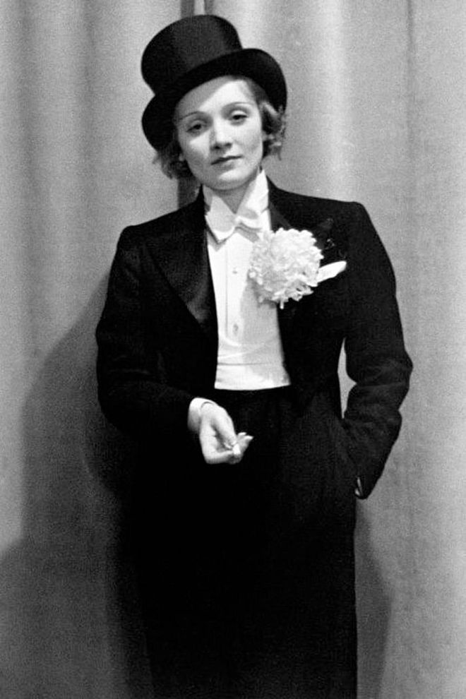 The original style chameleon , Marlene Dietrich frequently transformed her style under the spotlight. She was one of the first women to be photographed wearing a full tuxedo in the '30s, which contrasted her blonde, wavy locks. Other photographs show her wearing ties, bulky blazers, feminine midi skirts and lush furs. She opened the public eye to ever-changing fashion and the fact that women can wear mens' pieces too—and still be elegant.