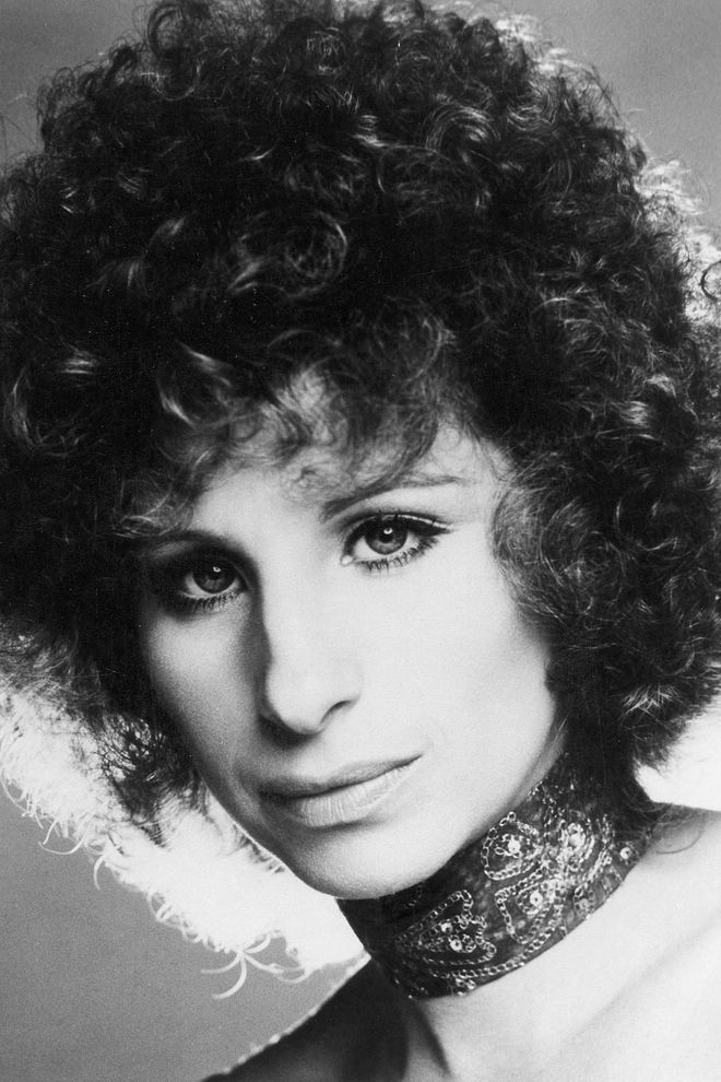 Barbra Streisand's iconic curls and cropped cut from her A Star is Born era is one of the most recognizable hair looks in history.

Photo: Getty