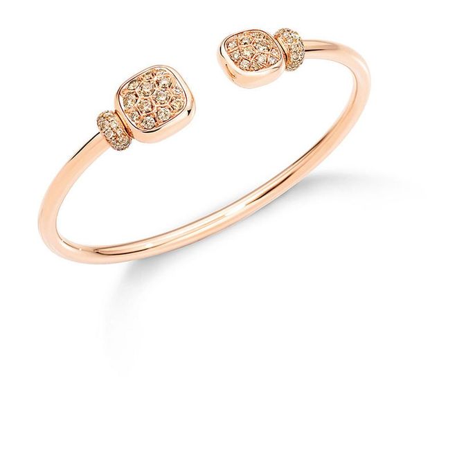The Nudo Solitaire cuff comes in rose gold with brown diamonds