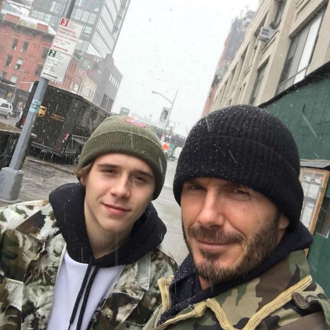 Making a case for grown-up dad-and-me style, David and Brooklyn Beckham snapped a selfie in matching outfits while out in New York. The duo wore camo jackets, black hoodie sweatshirts and beanies. Photo: Instagram