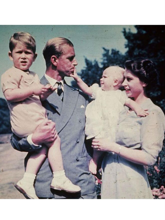 In August 1951, Prince Philip and then-Princess Elizabeth hold their children, Prince Charles and Princess Anne.
Photo: Keystone/Getty Images
