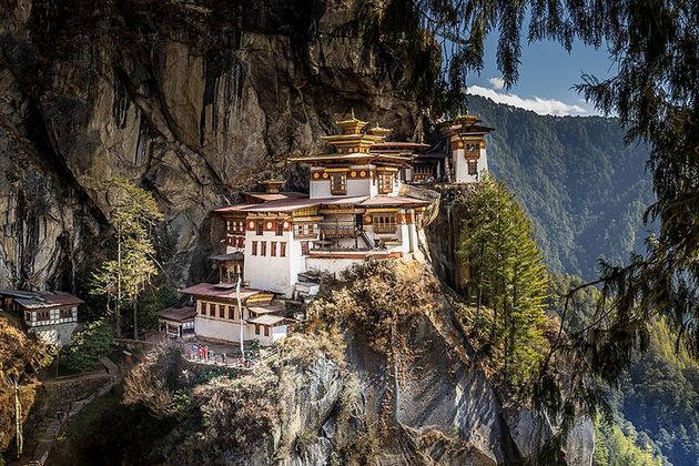 Scott Dunn’s off-beat itinerary includes hiking to the famous Tiger’s Nest Monastery perched on the side of a mountain in Bhutan.