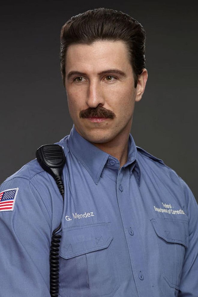 With his thick, straight pornstache — ahem, mustache — this guy is one of the most antagonistic characters of the first couple seasons. Photo: Netflix