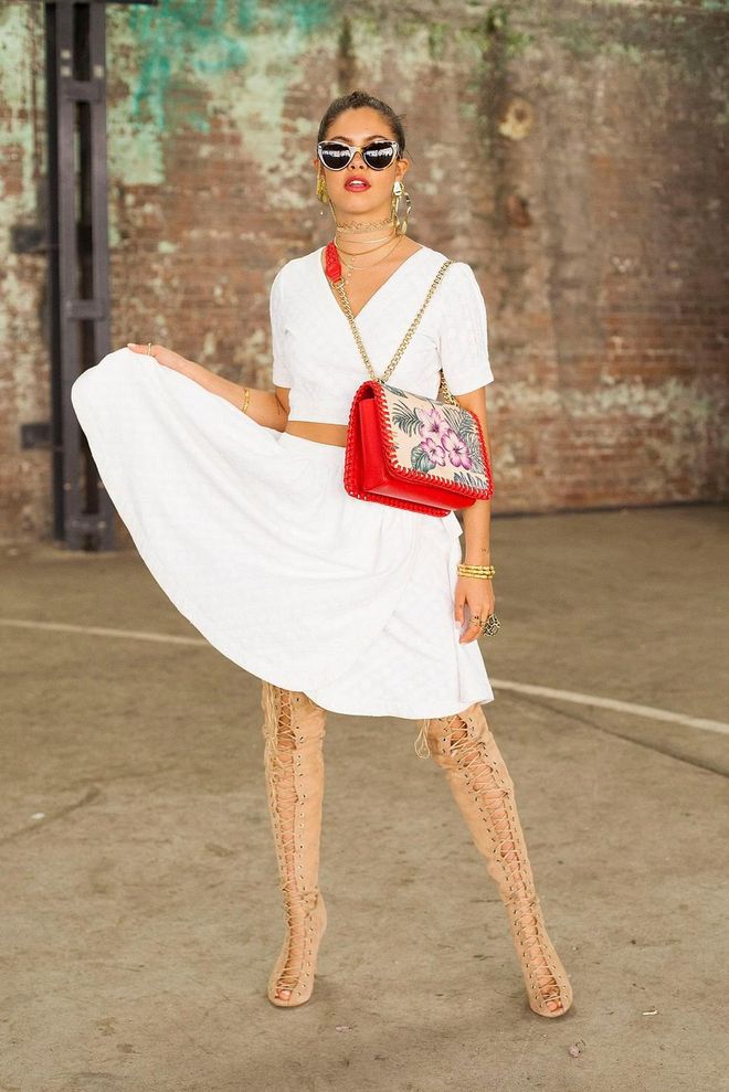 Dancer, Model and Social Influencer Mimi Elashary wearing a She made me dress, Hansen and Gretel bag, Tony Bianco shoes, Pamela Love and Maniamania jewellery and Lucy Folk sunglasses. Photo: Getty 