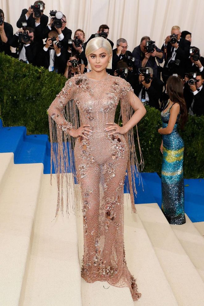 Kylie Jenner started the ball rolling with this nude pink "naked" dress covered in every embellishment you can think of. Photo: Getty 