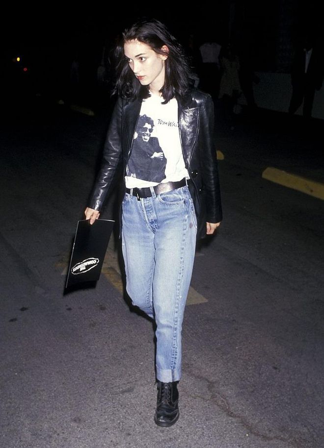 Leaving a film premiere in leather and denim, 1991. Photo: Getty 