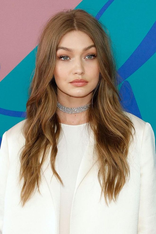 Why doesn't our hair look like Gigi's tousled waves every morning? 

Photo: Getty Images