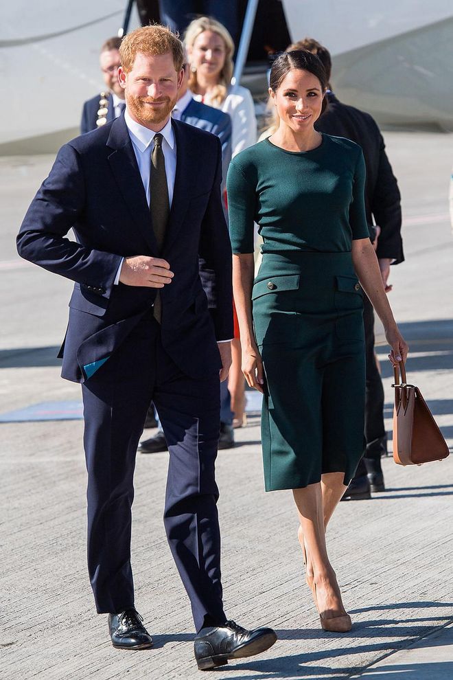 Fresh from the RAF centenary celebrations, the Duke and Duchess of Sussex touched down in Dublin for the start of their two-day tour. While Harry was smart in a navy suit, Meghan opted for a green Givenchy dress with nude court shoes and a tan Strathberry bag.
Photo: Getty
