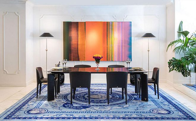 The dining room set up that makes the artwork sing. (Photo: Versace)