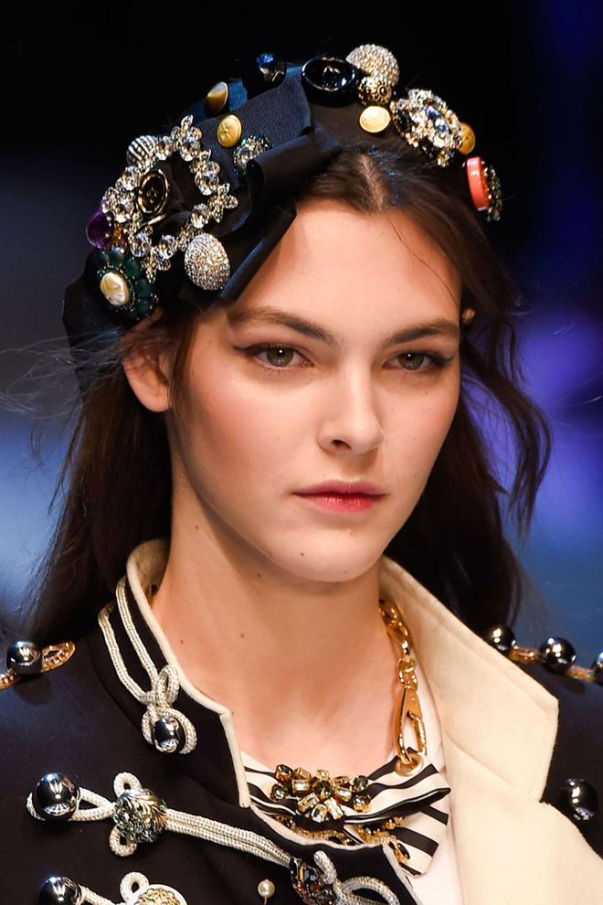 The Dolce & Gabbana fairy tale came into its own with the show's hair and make-up. Each model-turned-princess had flawless skin, rosy cheeks and pretty pink lips. Most also had intricate hair accessories, too.
