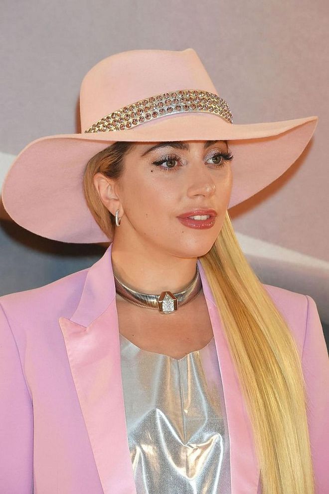 A pin-straight style only adds length to Lady Gaga's golden mane. Photo: Getty