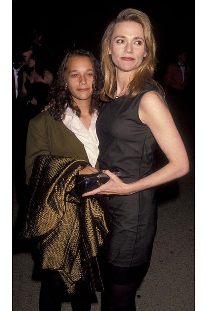 Jones attended the Emmy Awards for the first time in 1990 when she was just 24, with her mom, Peggy Lipton. She wore an oversized brown suit and a criss-crossed white blouse...which it's fair to say we'll never see the likes of on a red carpet again.