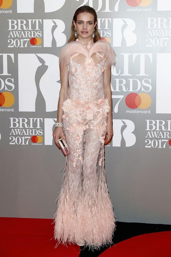 Natalia Vodianova looked ethereal in a pastel pink dress with feathered hemline and Buccellati jewellery. Photo: Getty