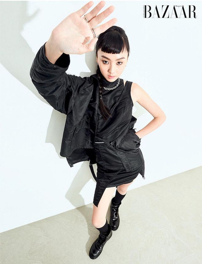 Jacket; top; skirt, 20559 by Justin Chua. Rings; necklace; socks; boots, Chua’s own. (Photo: Phyllicia Wang)