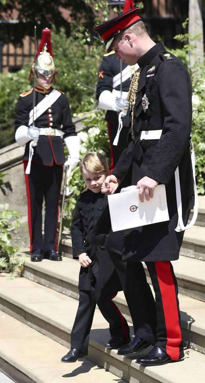 Best man Prince William walks page boy Prince George out of Prince Harry and Meghan Markle's wedding at St George's Chapel, Windsor Castle on May 19, 2018.

Photo: Getty