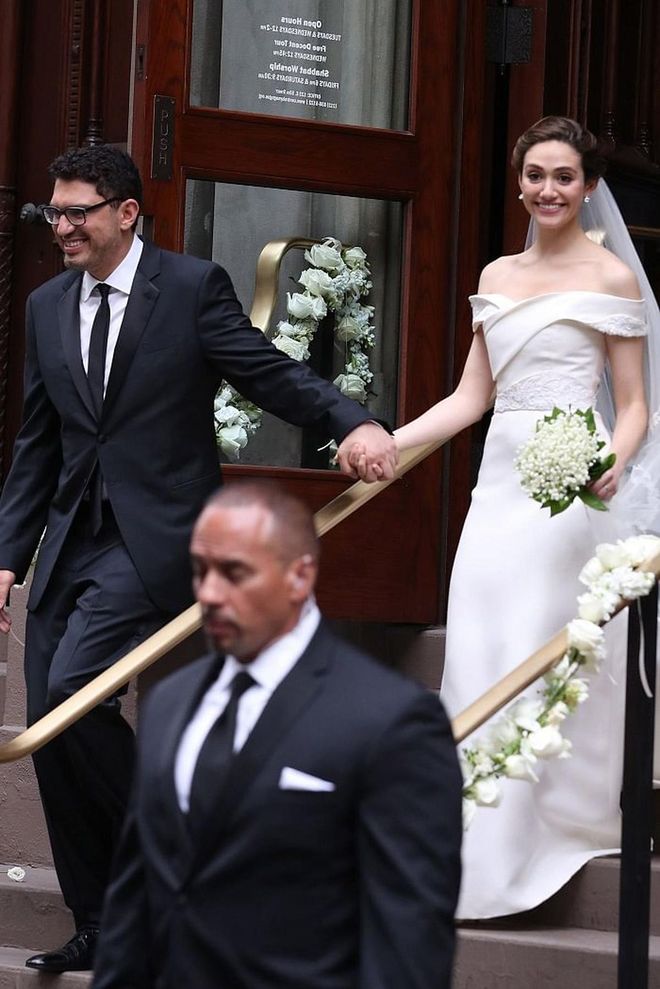 Emmy Rossum wed the Mr. Robot creator and award-winning producer Sam Esmail at a synagogue on the Upper East Side of Manhattan this past May. The bride wore a custom gown by Carolina Herrera, and the guest list included a long list of the couple's famous friends, like Hilary Swank, Rami Malek and Robert Downey Jr. Photo: Getty 