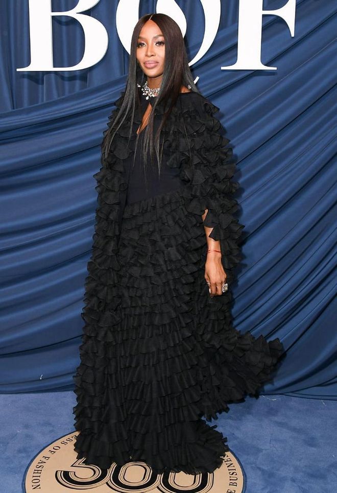 Naomi Campbell made a dramatic entrance in a voluminous tiered black gown.

Photo: Getty