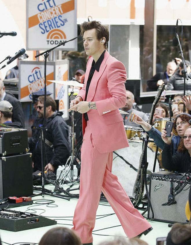 How many men do know looks this good in a salmon pink suit? 