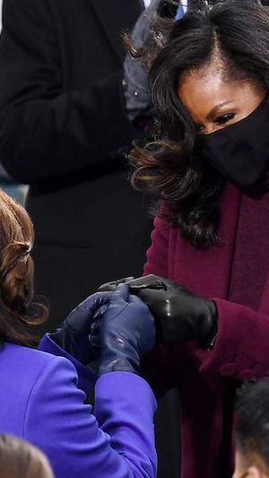 Vice President-elect Kamala Harris (L) is greeted by former first lady Michelle Obama (R) during the 59th Presidential Inauguration. (Photo: Olivier Douliery/Getty Images) 