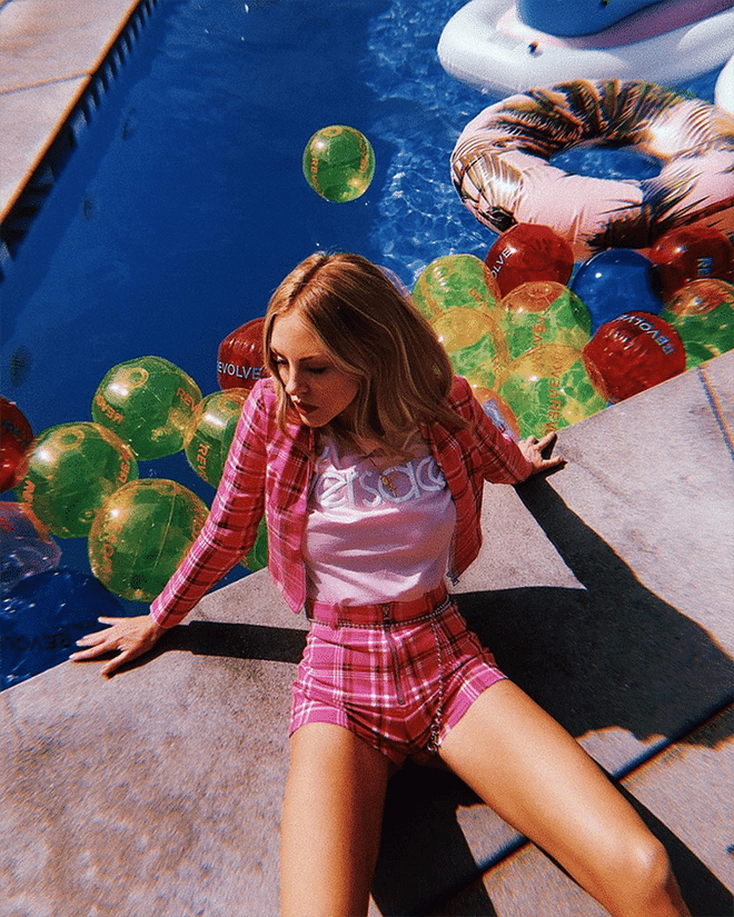 Logo tees are here to stay and the one to have right now is all about vintage Versace. Wear it with a shorts suit like Shea Marie.

Shop it: Versace t-shirt, $350, mytheresa.com.