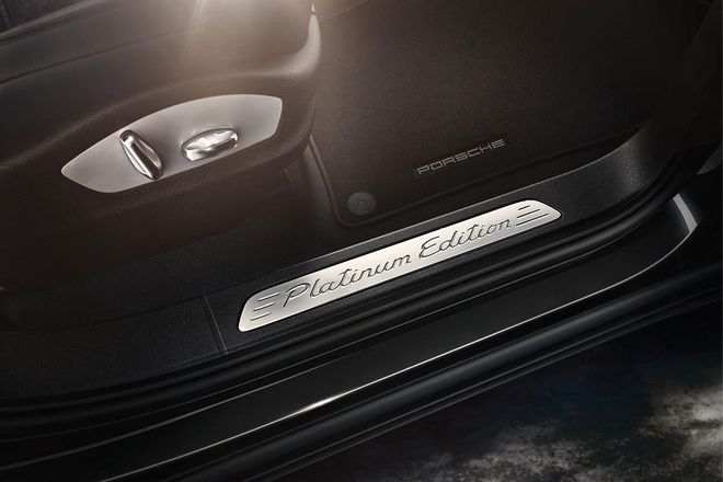 Make a statement with “Platinum Edition” lettering on stainless steel door sills in the Cayenne Diesel; and an illuminated version in the Cayenne S E-Hybrid Platinum Edition. Photo: Courtesy of Porsche