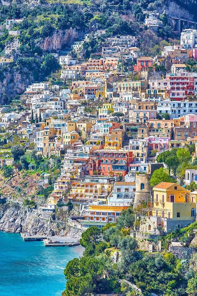 Along the cliffside of this southern Italian town is a pebble beachfront and steep waterfront filled with some of the brightest and most colorful buildings ever. Not to mention there are plenty of white beaches and sea caves to explore while you're there.