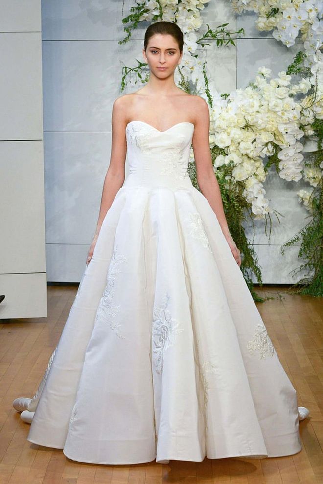 A classic, strapless gown will suit any ceremony venue- as long as it's accessorised to perfection. For a rustic affair, think easy hair (a mussed knot or soft waves) and minimal jewelry. Monique Lhuillier "Juliette" gown, moniquelhuillier.com. 
