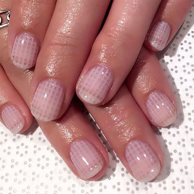 The subtle side of nail art: sheer, pink crisscrossed lines.
@vanityprojects
