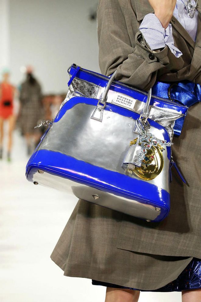 Seen at: Paris Fashion Week//Why we love it:  Galliano ventures into futuristic territory with this number. It gleams in silver and is traced with cobalt blue, making it perfect for those who want to stand out without trying too hard. (Photo: Getty)