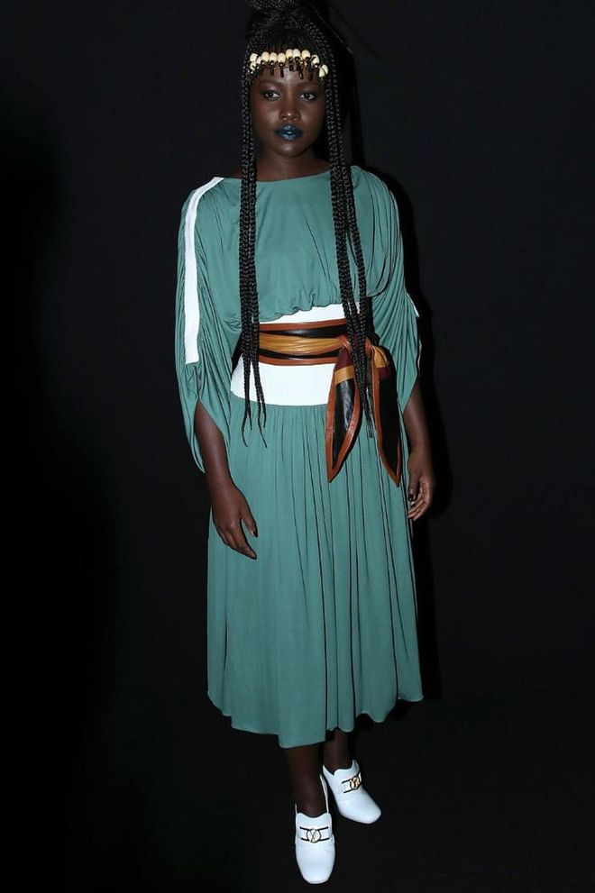Lupita Nyong'o added a statement tie-up belt to her look.

Photo: Bertrand Rindoff Petroff / Getty