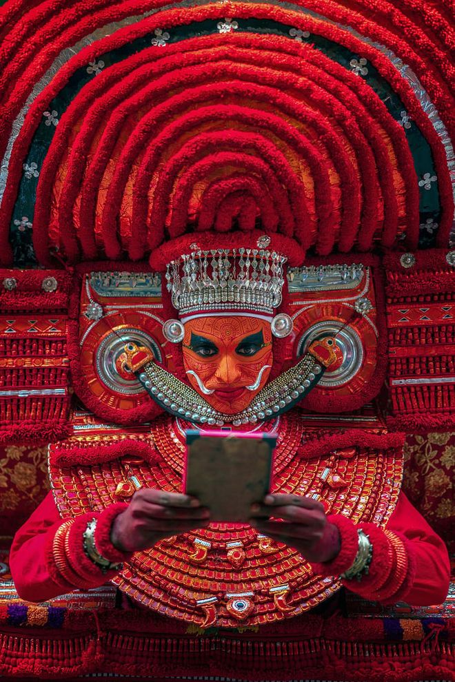 Chandran photographs the Theyyam ritual, which is performed in temples in the north of Kerala, India. The performer transforms from human to a demigod through music, dance, make-up and costume.