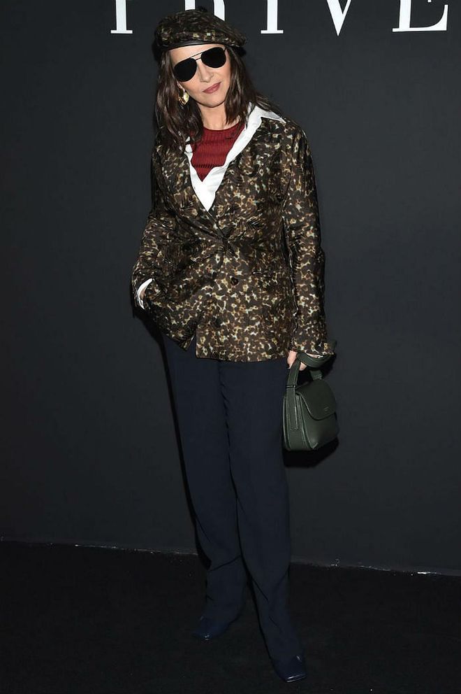 Juliette Binoche wore a patterned blazer and a matching beret.
