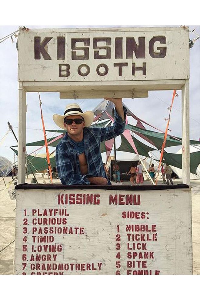 Speaking of Scott Eastwood, the actor posted up at a kissing booth during his time at Black Rock City. He says he didn't get any takers (yeah right), which he jokingly attributed to being a little too dusty.