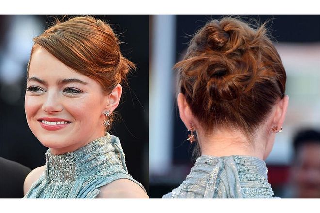 Emma Stone's 'do-cisions never disappoint. The most recent example: these vertically stacked whimsical knots spotted on the Venice Film Festival red carpet. Photo: Getty
