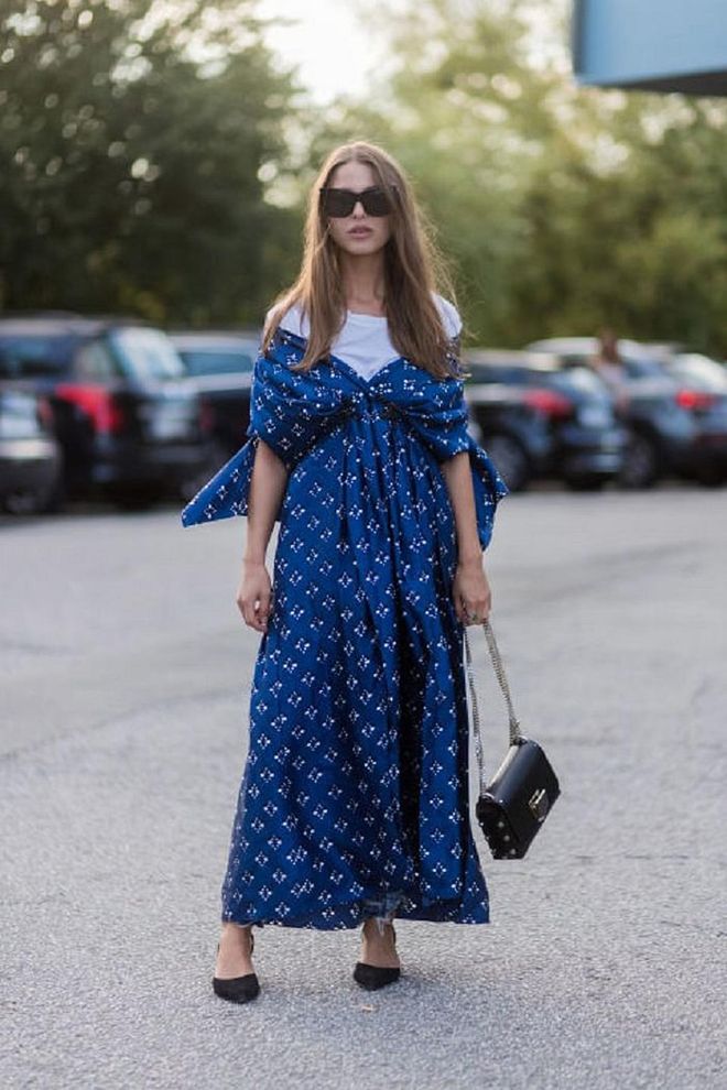 Evening gowns won't look out of place during the day if you layer them up with T-shirts and sunglasses. Photo: Getty 