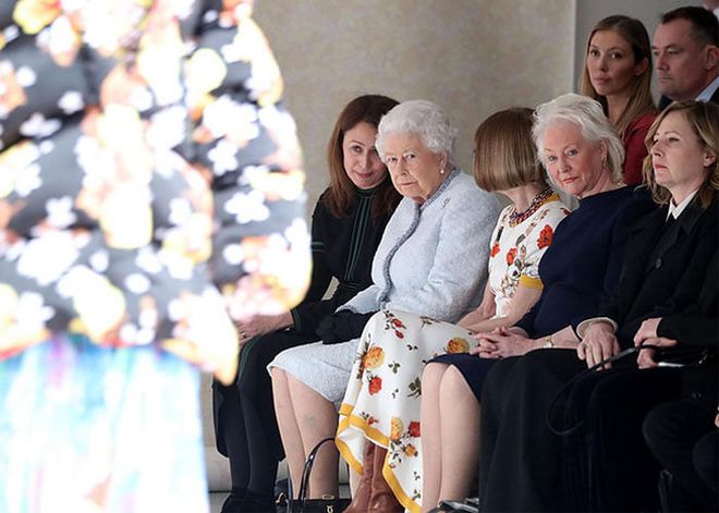 We don’t know what the royal protocol is 
for cheering a monarch on at a fashion show, but in the summer of 2019, that was all we wanted to do: Praise HM Queen Elizabeth II for swapping the throne for the front row at London Fashion Week. The queen’s appearance at Britain’s latest fashion wunderkind Richard Quinn’s autumn/winter 2019 show was the most talked-about event that fashion season.