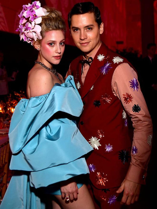 As for Reinhart and Sprouse, maybe distance didn’t really make the heart grow fonder. Sources claimed that forced time apart due to social distancing and separate self-isolation influenced the split between the two actors. However in the spirit of young love’s off-again on-again nature, we somehow have a feeling that once Riverdale  resumes production, Lili and Cole, who play love interests Betty Cooper and Jughead Jones on the hit CW series will have to be around each other. Sparks may fly and they just might get back together.