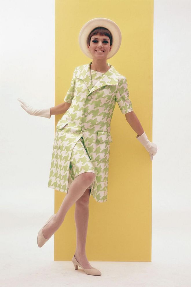 A model wears a green and white houndstooth set. Photo: Getty 