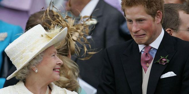 Prince Harry has a silly moment with his grandmother at Prince Charles' wedding to Camilla Parker Bowles. Photo: Getty