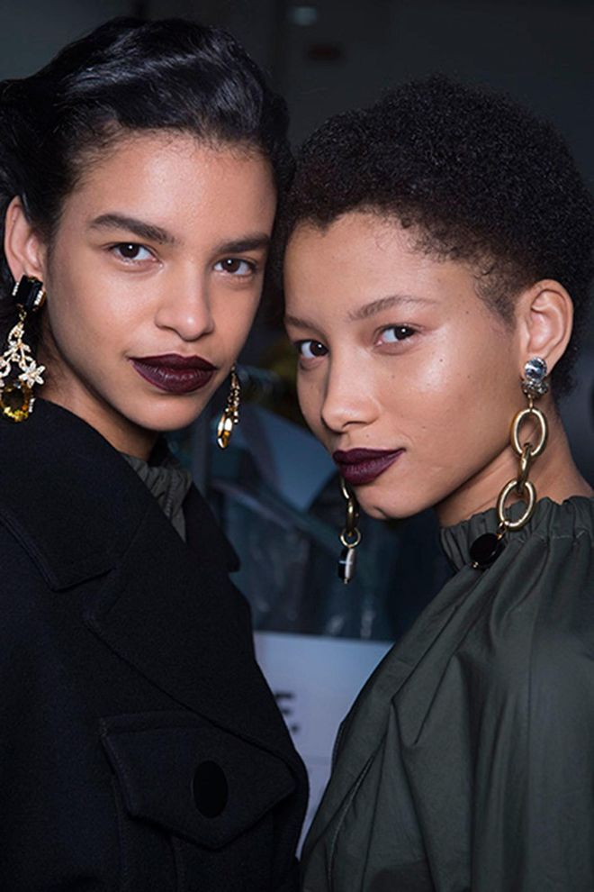 Dark, maroon lips and precisely sculpted waves formed the beauty look at Marni for fall/winter 2016.