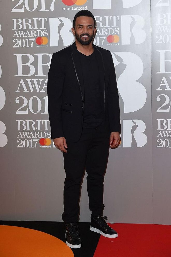 Craig David dressed down his suit with trainers. Photo: Getty