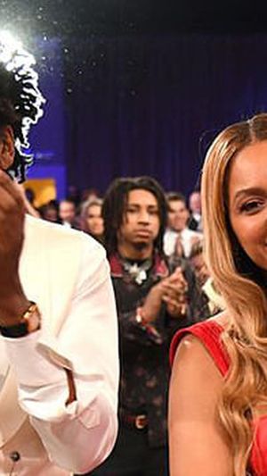 Beyoncé Wore A Scarlet Gown With A Hip-high Leg Slit At Pre-grammys Gala