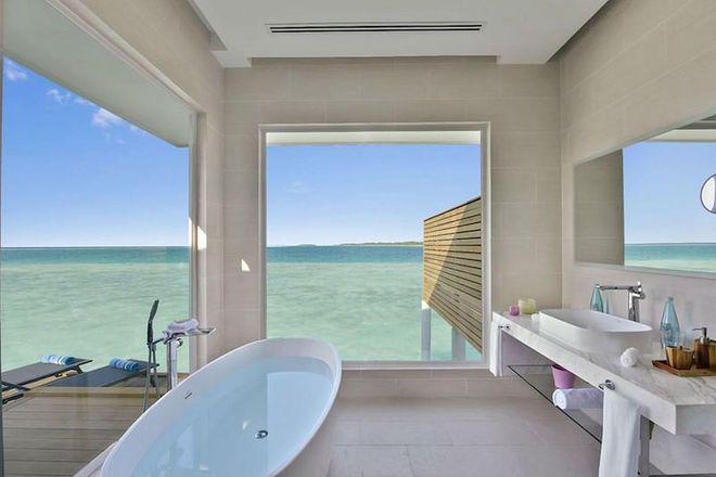 In the Aqua Villas at the newly-opened Kandima resort in the Maldives, guests can have a bath while looking out over the Indian Ocean. Guests regularly spot dolphins playing in the sea from the bath too - something quite different from the mouldy bath in your overpriced rented flat at home.