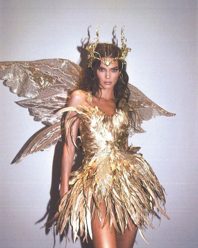 The model went metallic in an elaborate "forest fairy" costume.