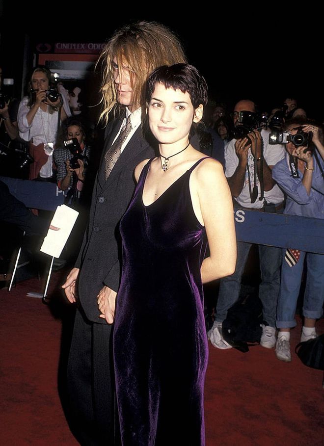 The '90s starlet dons a velvet slip dress at a movie premiere in 1993. Photo: Getty