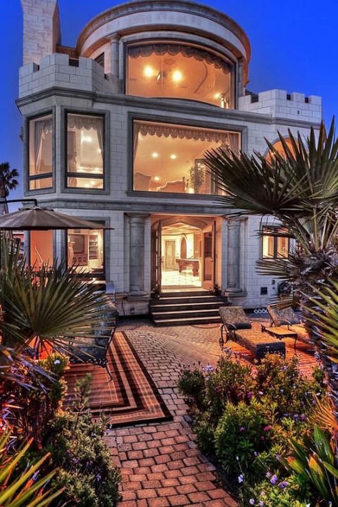 Asking Price: $8.9 million
Even though this beachfront castle in the O.C. was only built in 1990, it comes with all the of classic details — turrets, parapets and all.