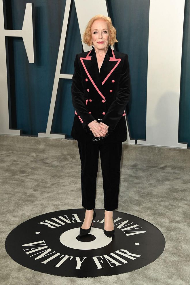 In a black and pink suit. Photo: Getty